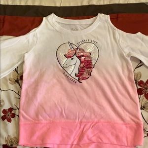 A off the shoulda shirt with long sleeves